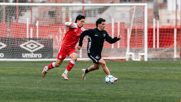 A digital dashboard displaying AI sports performance analytics for player load management.