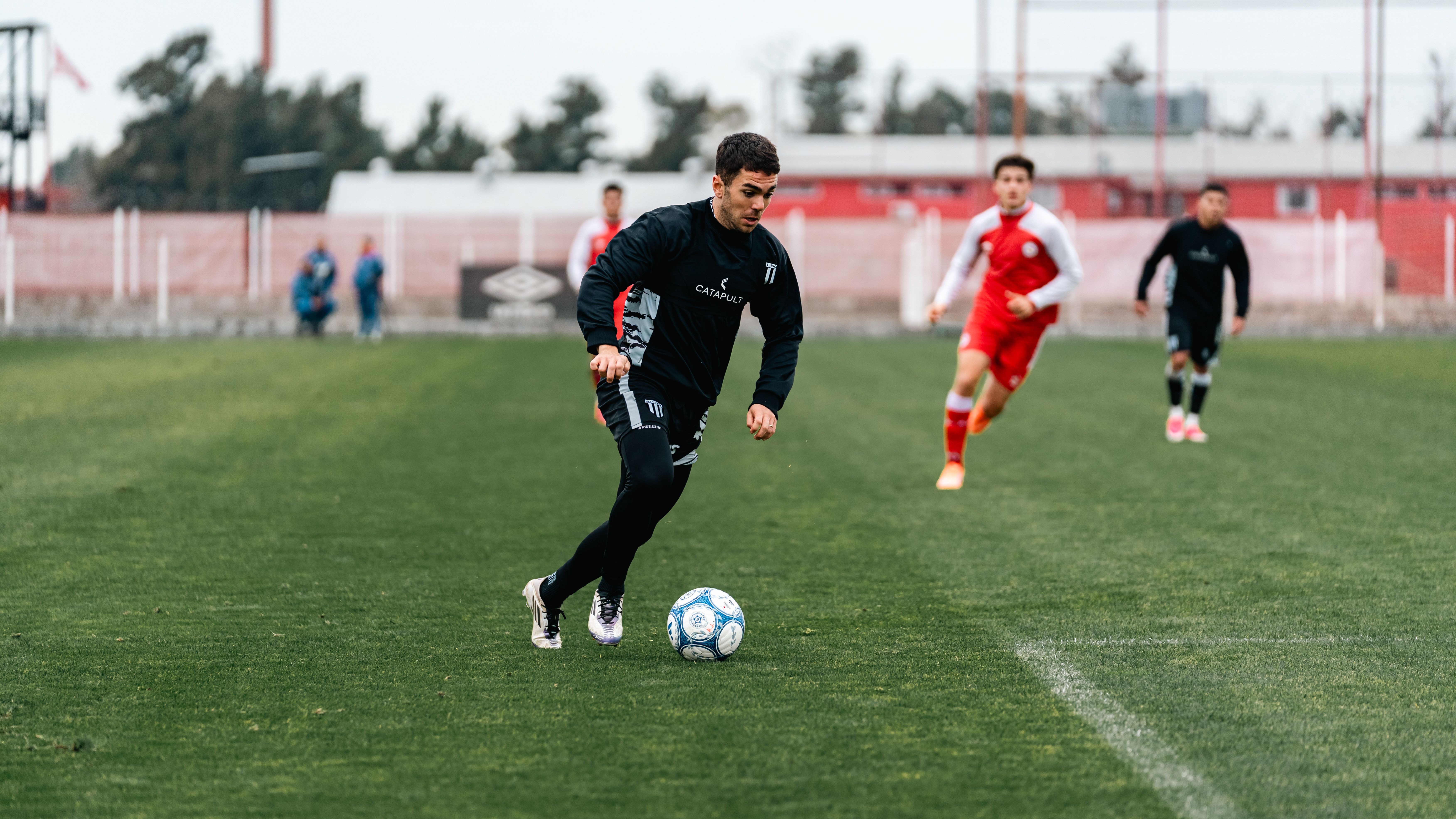 Dynamic capture of a soccer player dribbling during a competitive match.