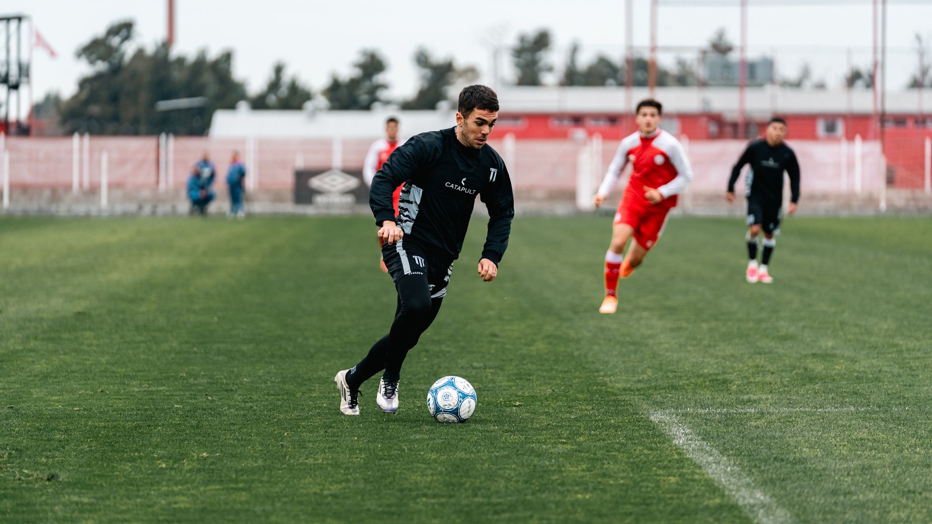 Dynamic capture of a soccer player dribbling during a competitive match.