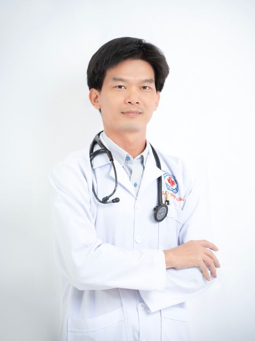 Free Confident male doctor posing with stethoscope in white coat on white background. Stock Photo