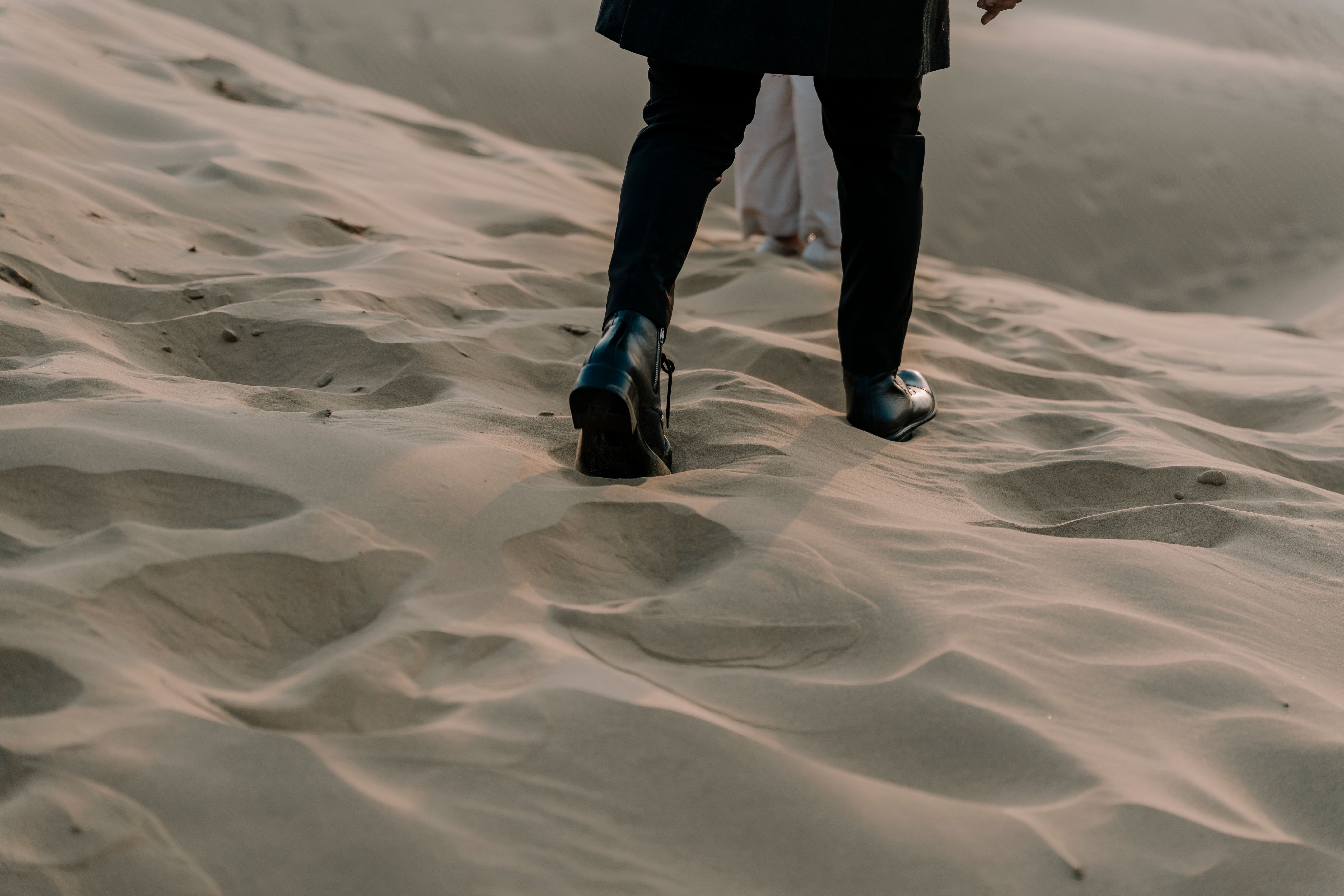 Footsteps across golden Sam Sand Dunes at Jaisalmer