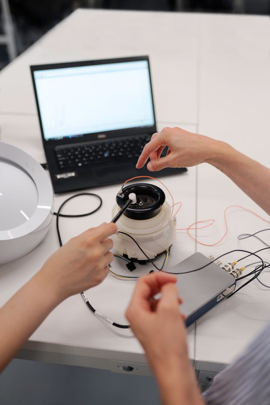 Engineers testing product quality