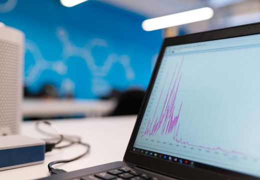 Business analytics and performance graphs on laptop