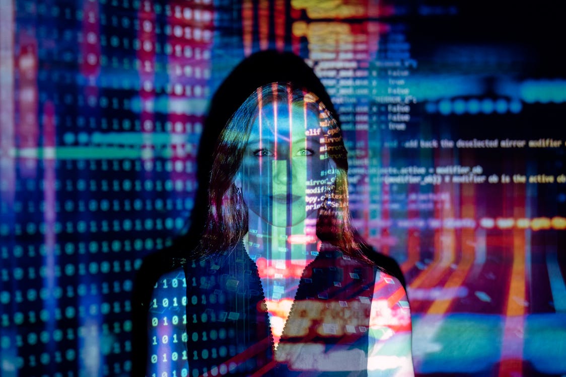 Free Code Projected Over Woman Stock Photo