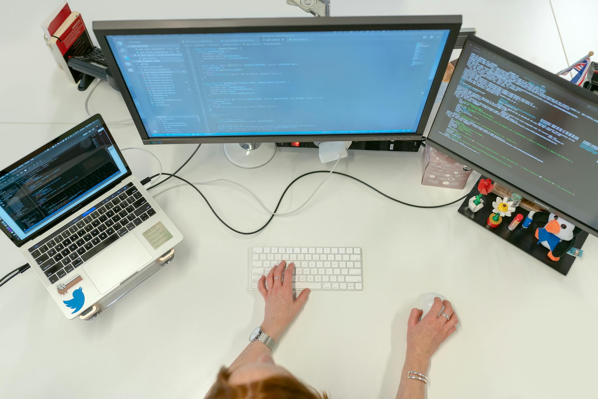 Female Software Engineer Coding on Computer