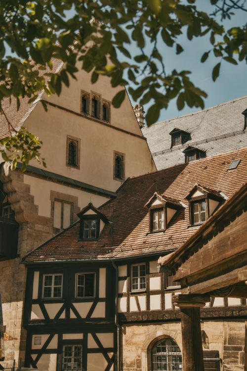 Free Explore charming old town architecture with timber-framed buildings in a historic German setting. Stock Photo