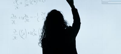 Mechanic working on RV component — slide-out motor and controller repair