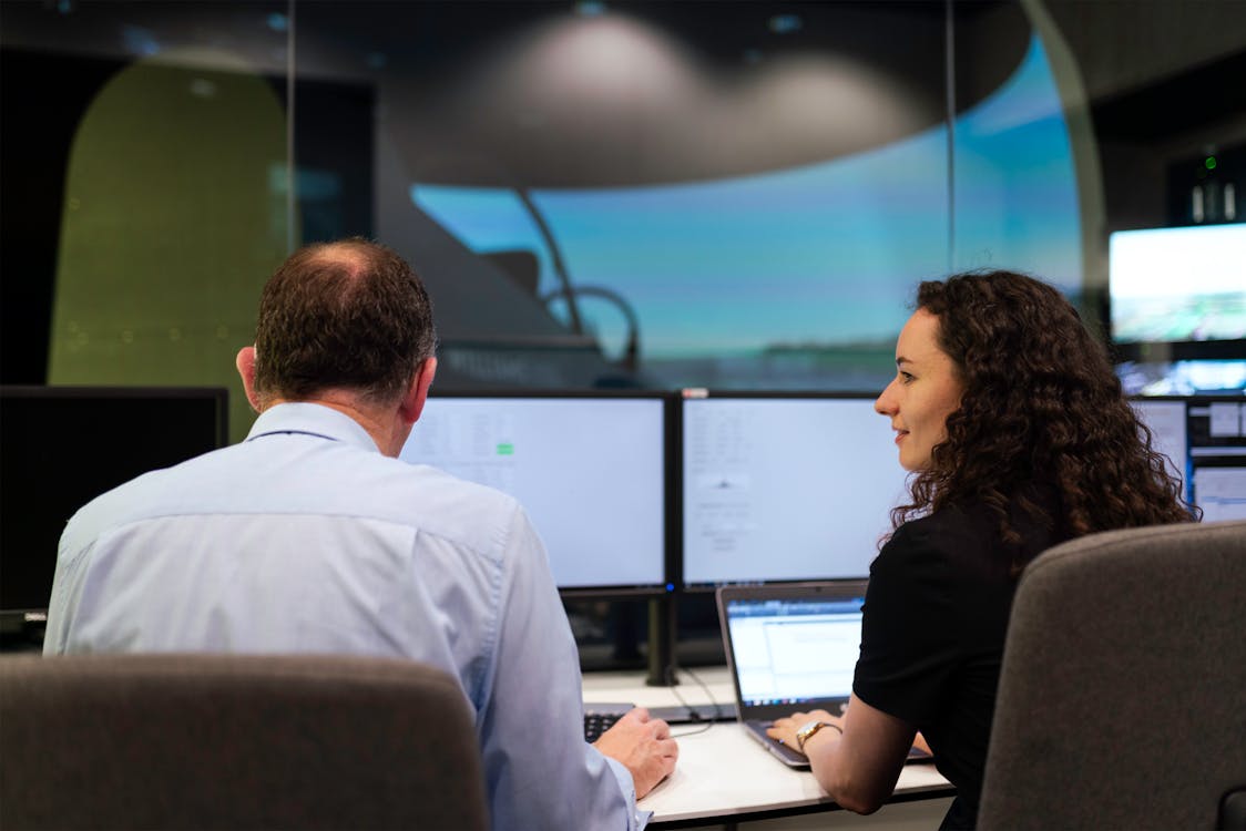 engineers-controlling-flight-simulator