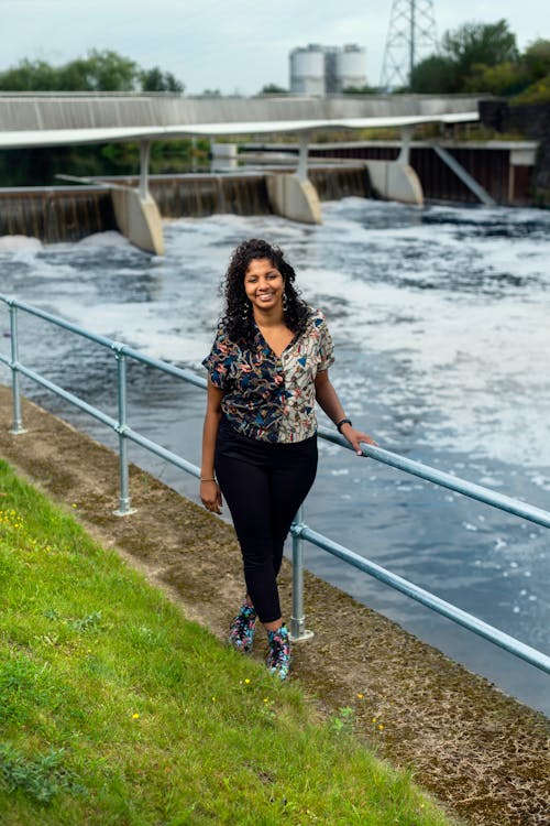 Free Female Engineer Standing by River Stock Photo