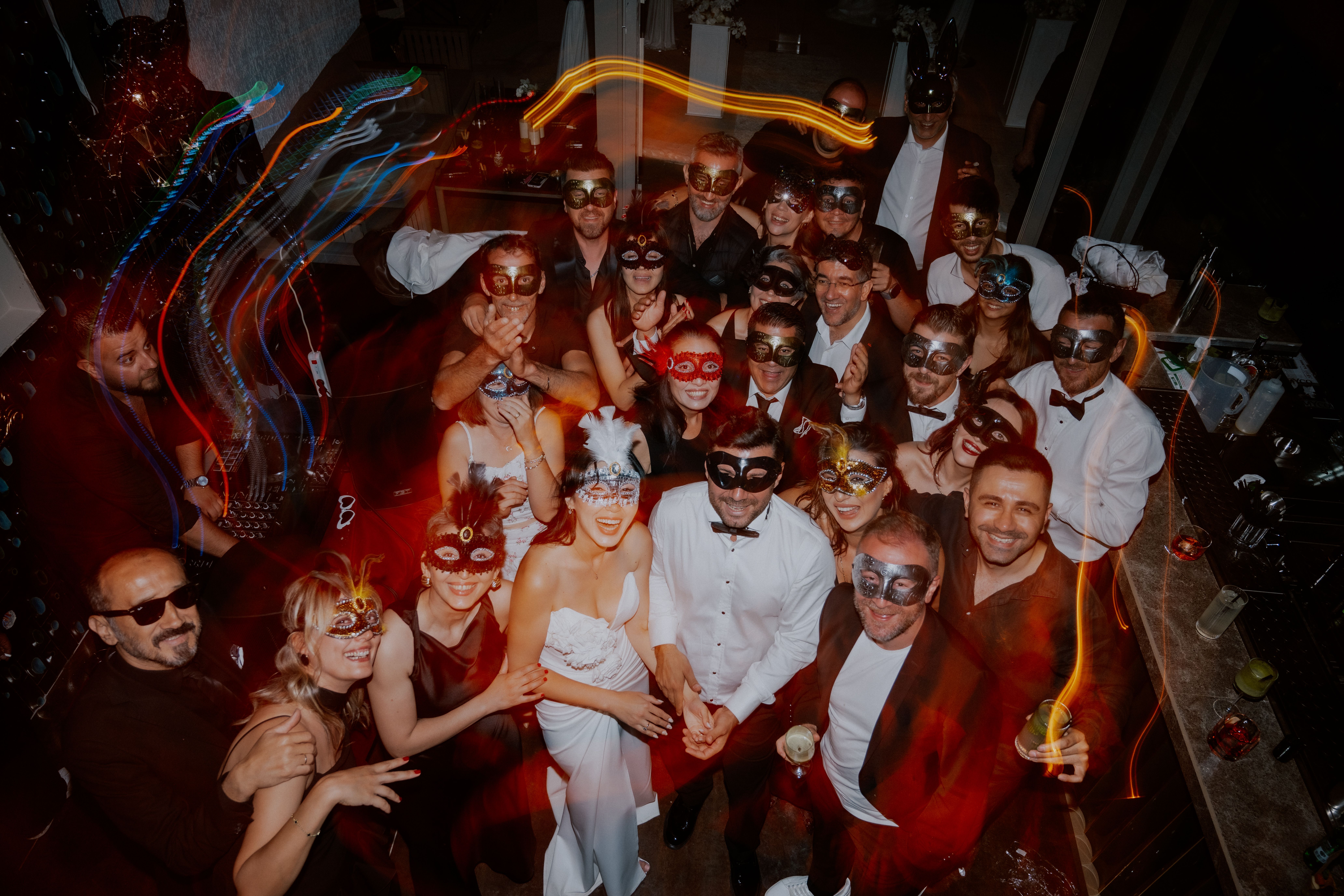 wedding entertainment ideas egypt — Group of people enjoying a lively masked party in Çanakkale, Türkiye.