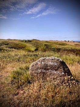 Discover the rugged beauty of Île d'Yeu's coastal trails with La Meule and Le Vieux Château directions.