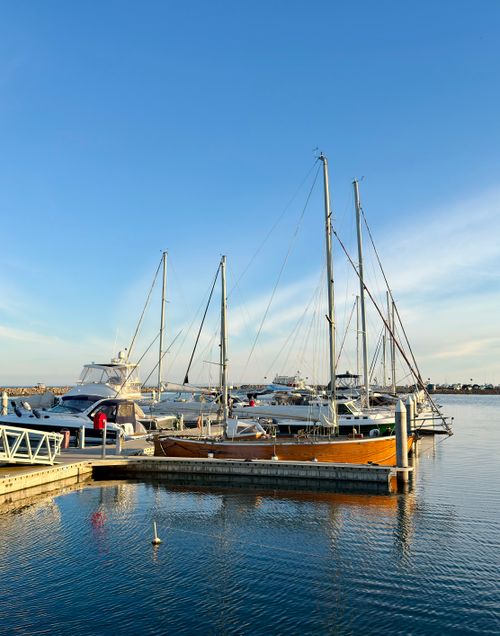 Free A tranquil view of sailboats docked at Werribee South Marina, Victoria, during a clear day. Stock Photo