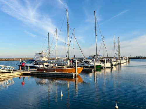 Free Tranquil yacht marina scene at Werribee South, Victoria under clear blue skies. Stock Photo