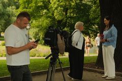 Crew filming an outdoor interview — photo by Hert Niks on Pexels