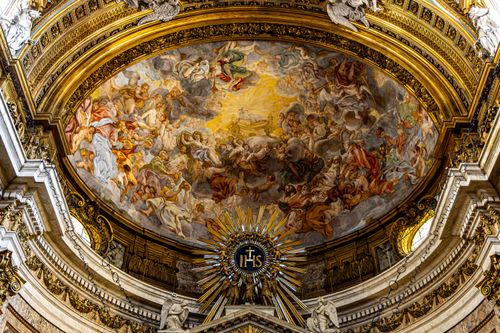 Free Stunning Baroque church dome ceiling with detailed fresco paintings. Stock Photo