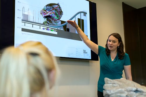 Free Female Engineer Holding Presentation Stock Photo