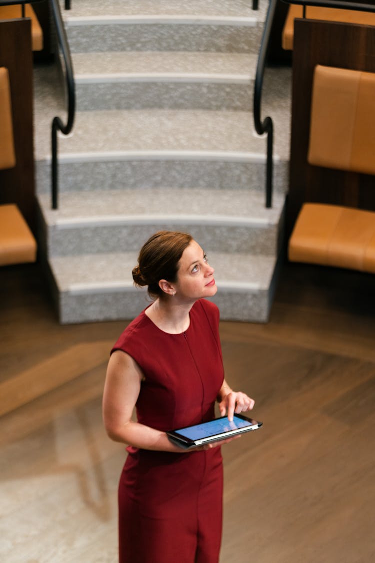 Photo Of Female Engineer Holding Digital Tablet