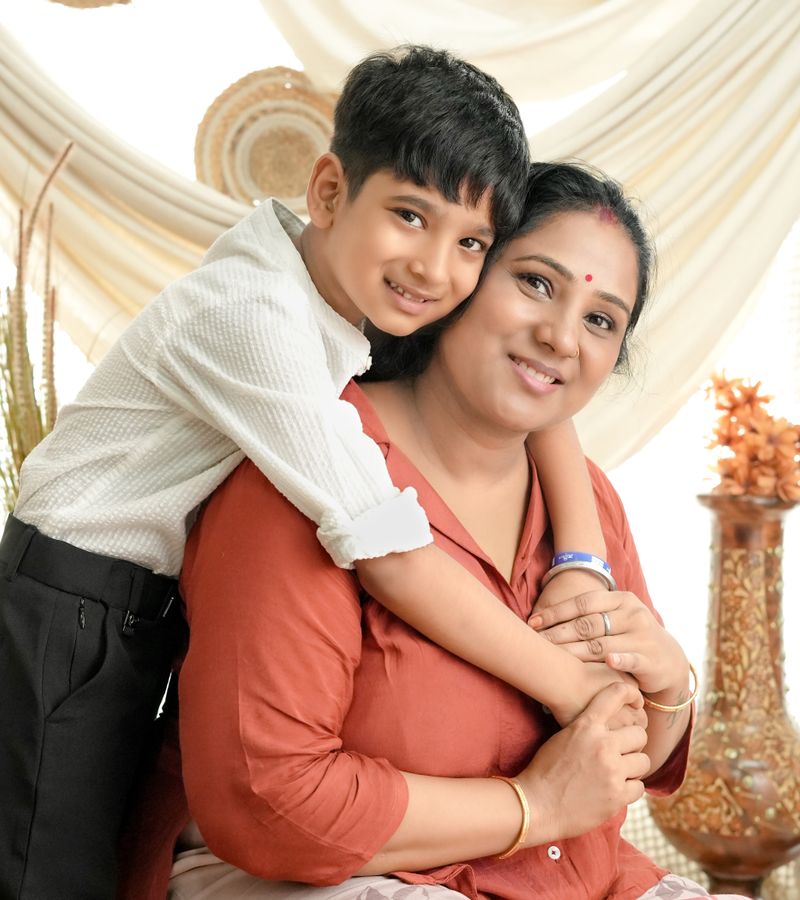 Caregiver assisting elderly parent at home