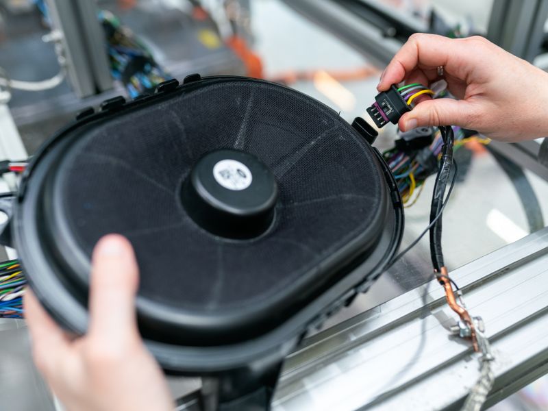 Vehicle fuse box and wiring loom being inspected