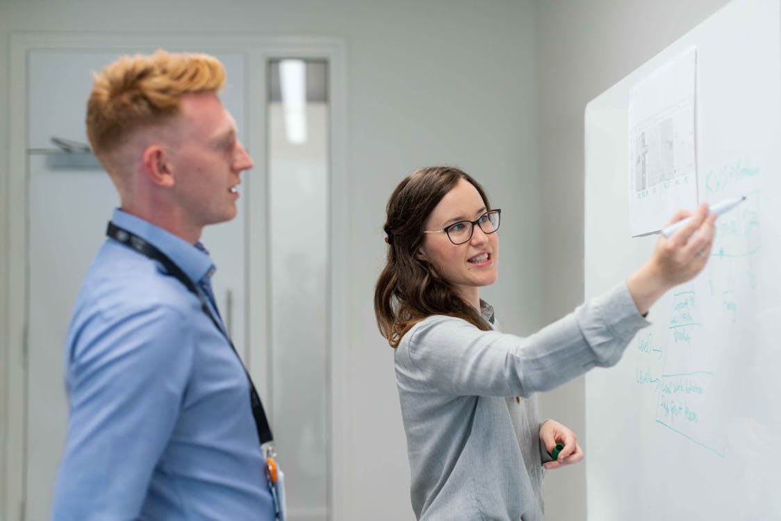 Free Female Engineer Holding Presentation Stock Photo