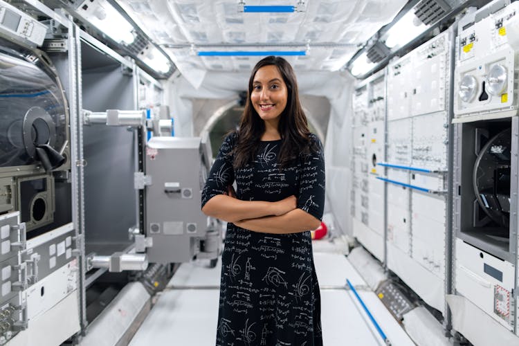 Female Engineer In Space Station