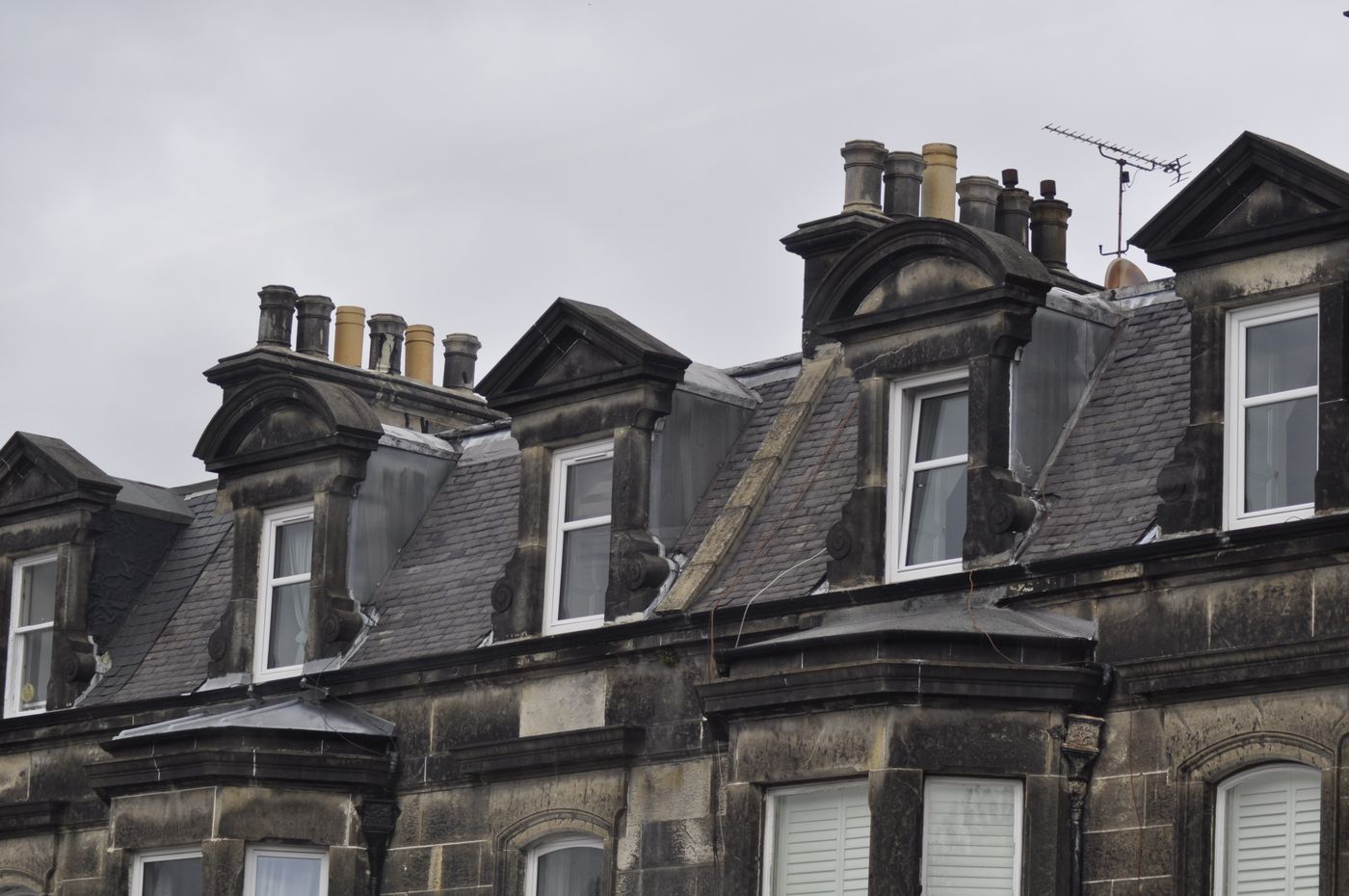 Victorian sandstone villas with pitched slate roofs in Morningside