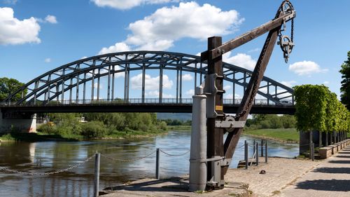 Free Beautiful view of an old arch bridge crossing the Weser River in Rinteln, Germany. Stock Photo