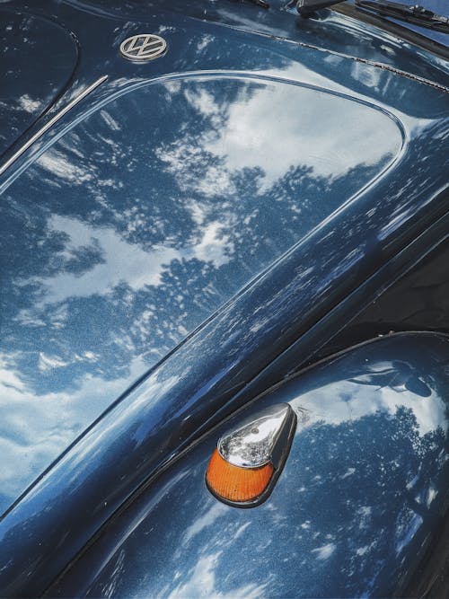 Free Blue Car With A Shiny Hood Stock Photo