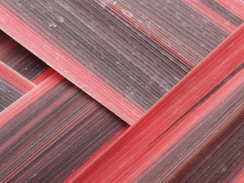 Free Abstract close-up of textured surfaces with red and gray stripes forming a geometric pattern. Stock Photo