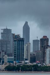 Mumbai's towers under stormy clouds