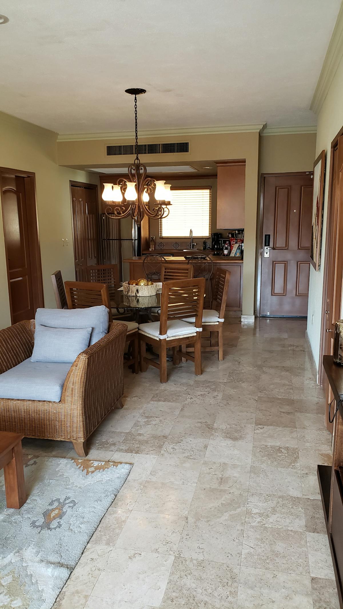 Cook slicing grilled chicken breast on a cutting board