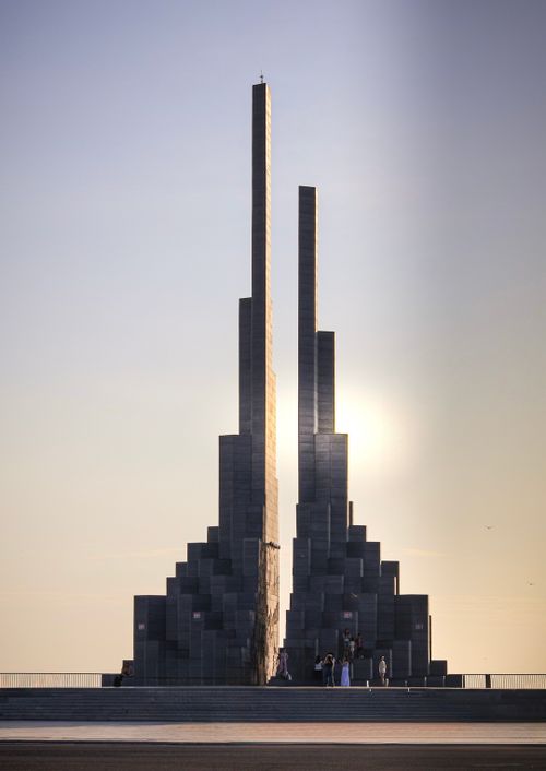 Free Tall monument in Da Dia Rocks, Phu Yen, Vietnam at sunrise, showcasing stunning architecture. Stock Photo