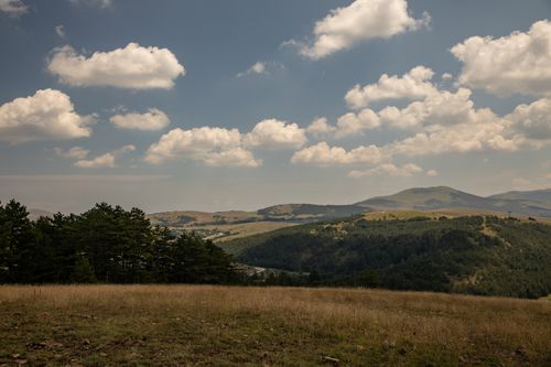Free Scenic landscape of rolling hills and clouds at Zlatibor, Serbia. Stock Photo