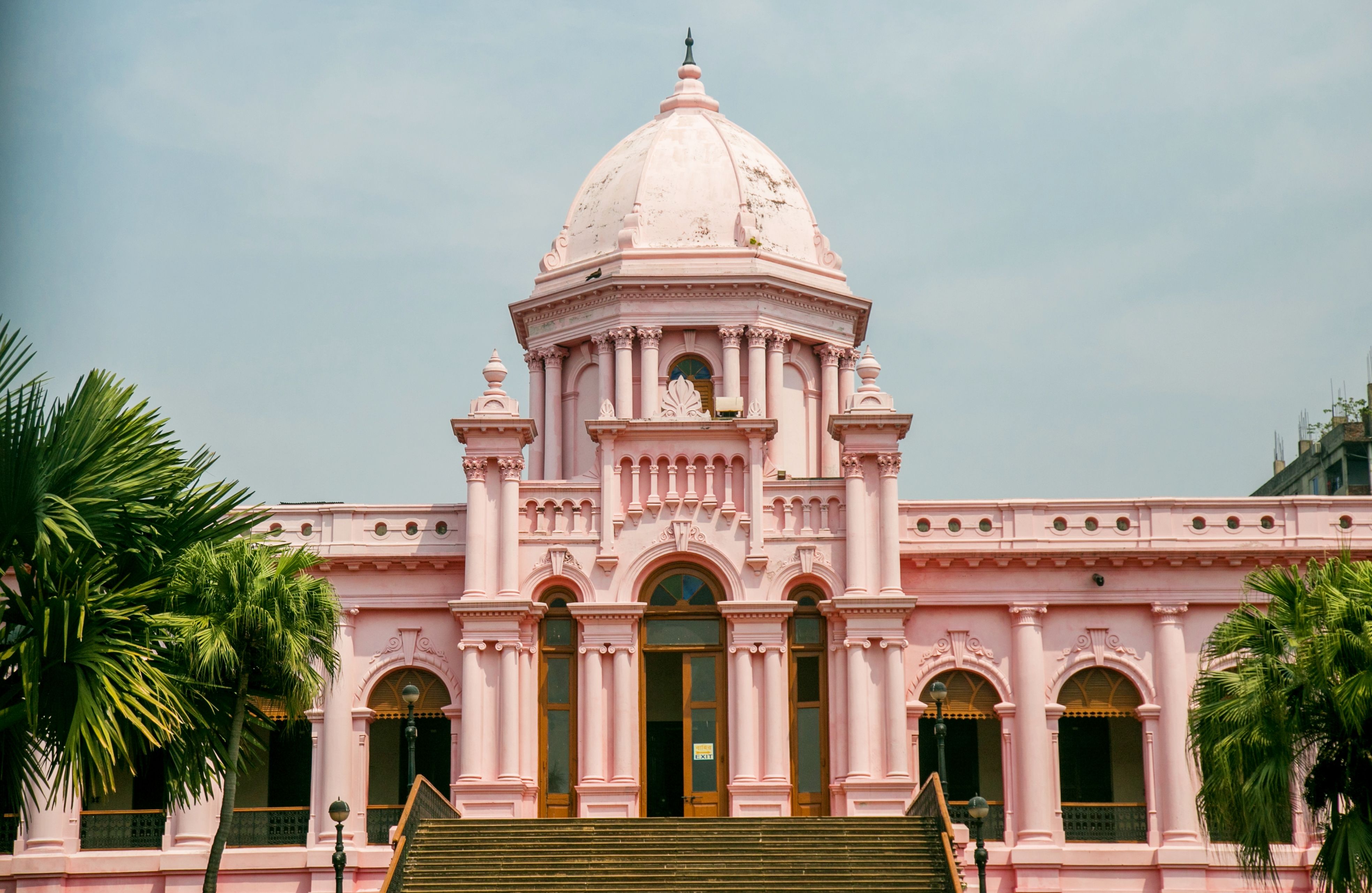 Front view of the iconic Ahsan Manzil, a historic pink palace in Dhaka, Bangladesh.