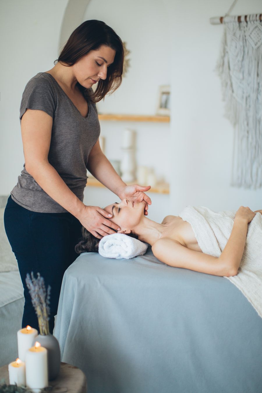 Serene facial treatment with candles at Lumière Med Spa
