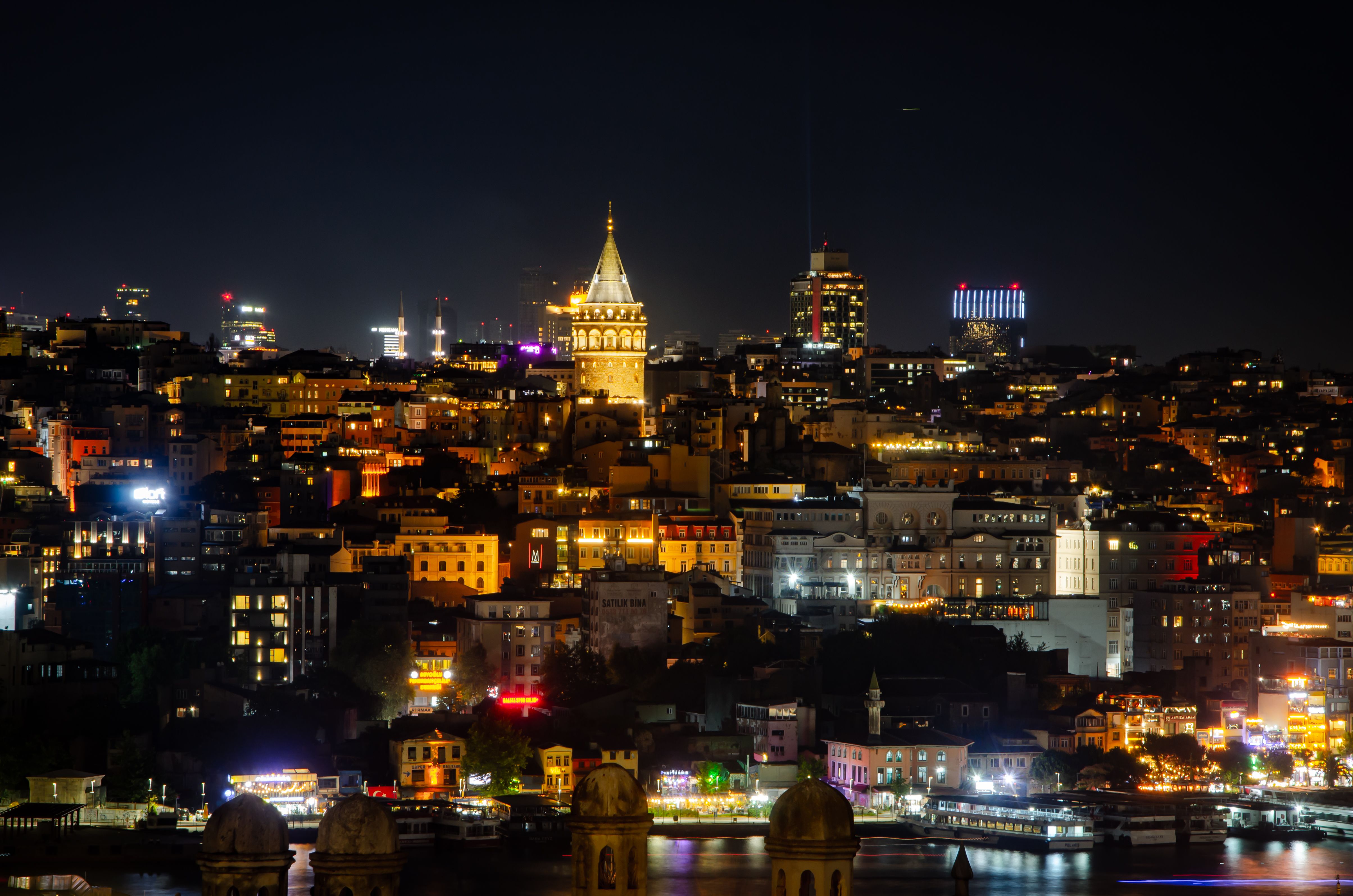 Stunning night view of Istanbul showcasing the iconic Galata Tower illuminated in the cityscape.