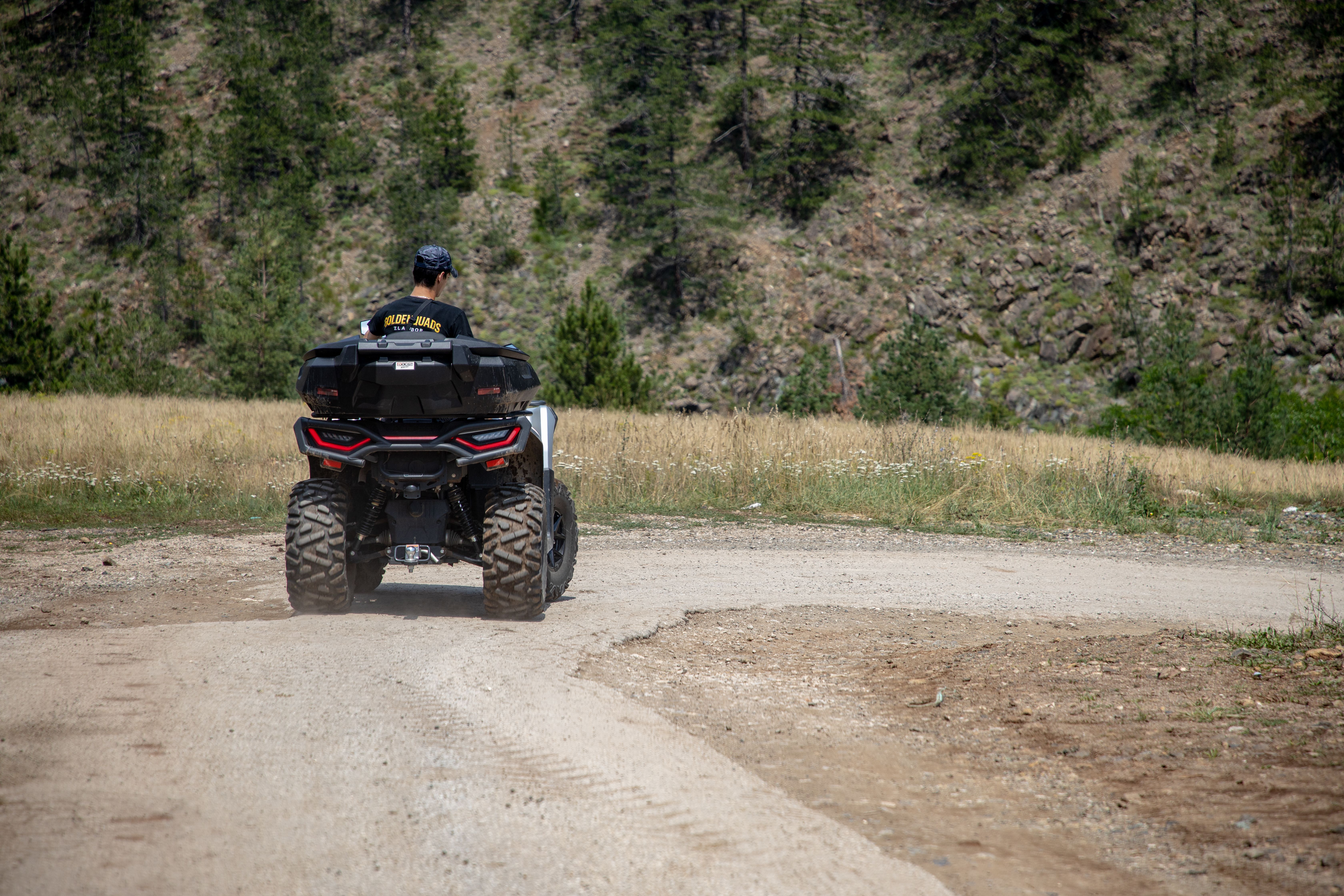 Adventure in Zlatibor, Serbia with an ATV exploring rough, rural landscapes.