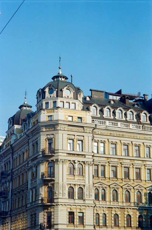 Free Ornate European architecture with intricate detailing under a clear blue sky. Stock Photo