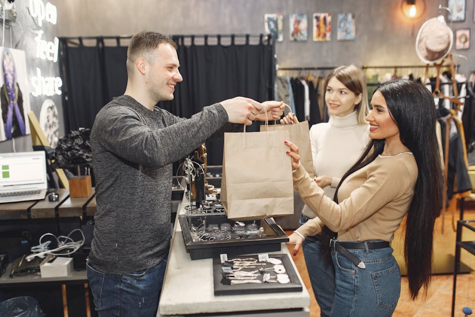 Female customers getting paper bags at counter desk