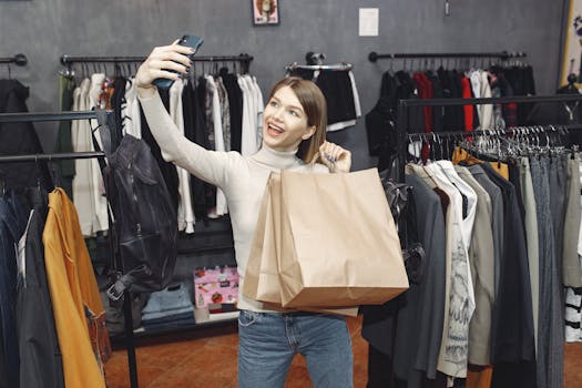 Cheerful woman takes a selfie while shopping in a stylish boutique store.