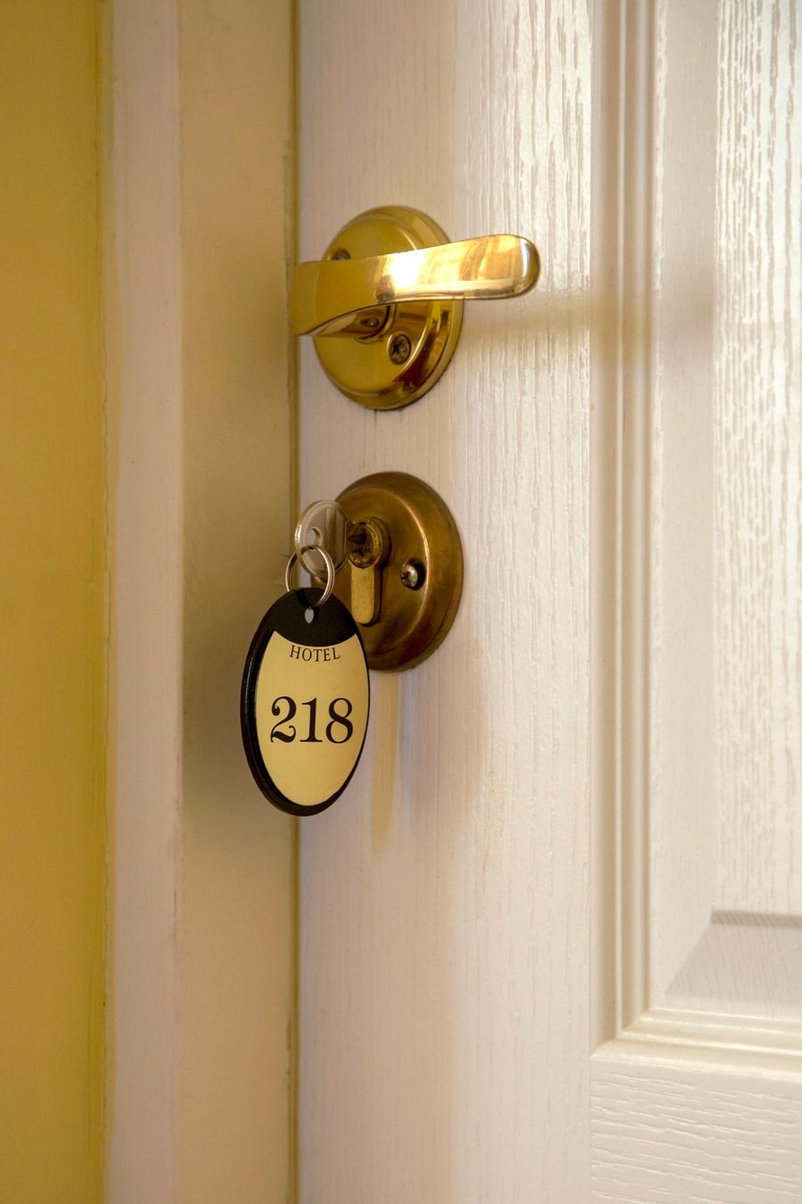 Premium hotel room door with a secure handle and room key