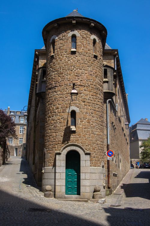 Free Charming medieval architecture in Saint-Malo, Brittany. Captivating stone façade under a clear blue sky. Stock Photo