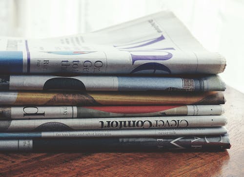 Free Stack Of Newspapers Stock Photo