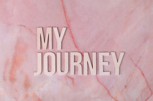 Free Inspirational text 'My Journey' on a pink marble background, symbolizing personal growth. Stock Photo