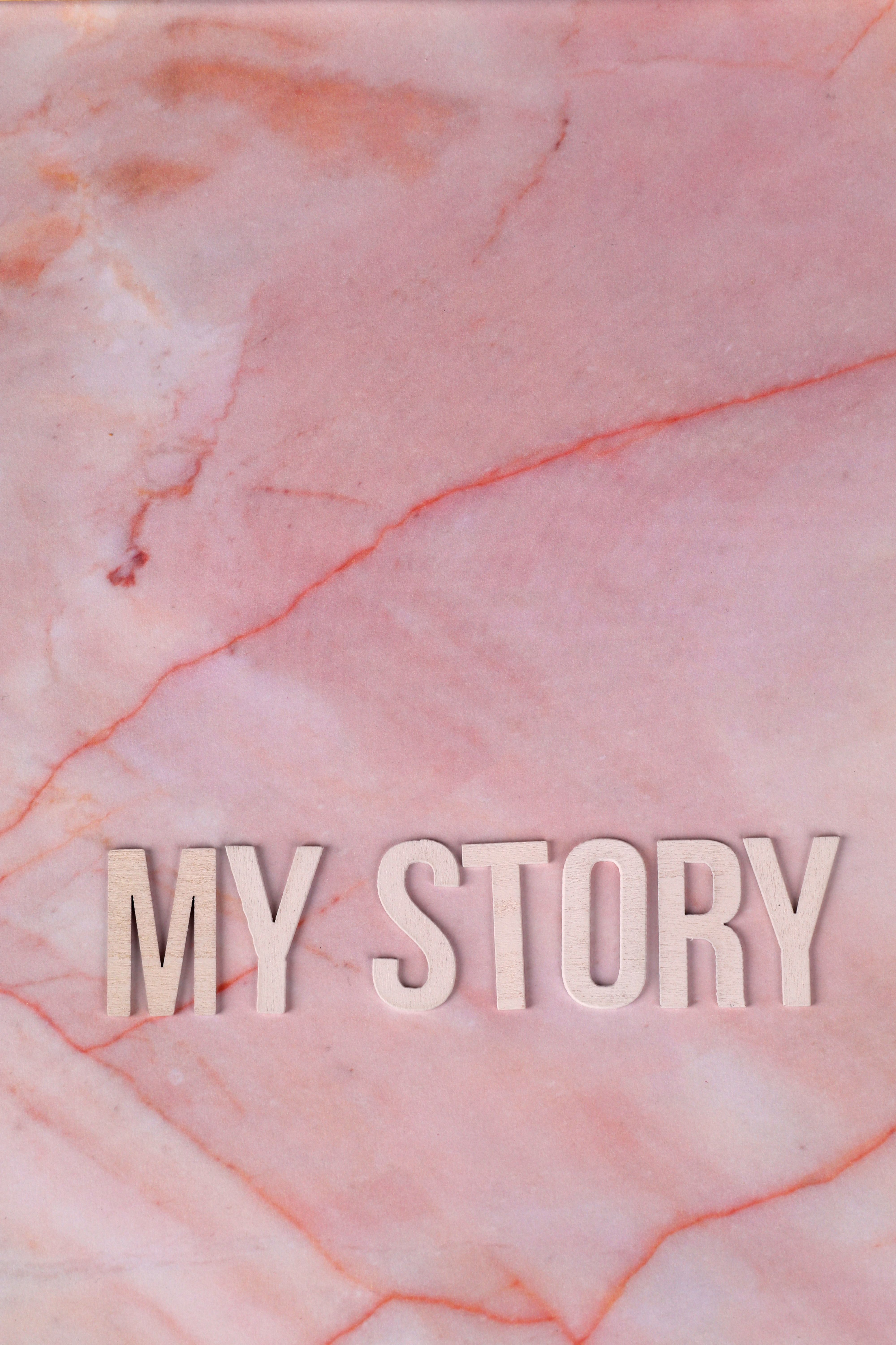 Pink marble texture with 'My Story' text in bold letters, providing copyspace.