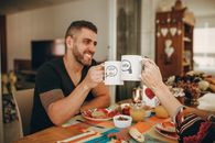 Man in Black Crew Neck T-shirt Holding White Ceramic Mug
