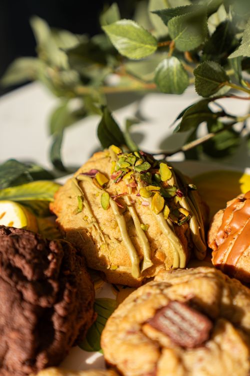 Free Delicious gourmet cookies with pistachio toppings, perfect for dessert lovers. Stock Photo