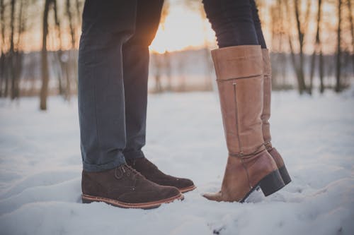 Two People Standing on Snow