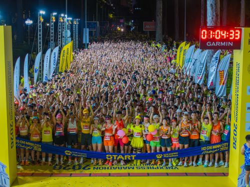 Free Excited crowd at the starting line of Ho Chi Minh City Marathon 2026. Stock Photo