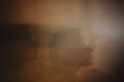 Free Ethereal blurred silhouette creating a mysterious atmosphere with soft, diffused lighting. Stock Photo